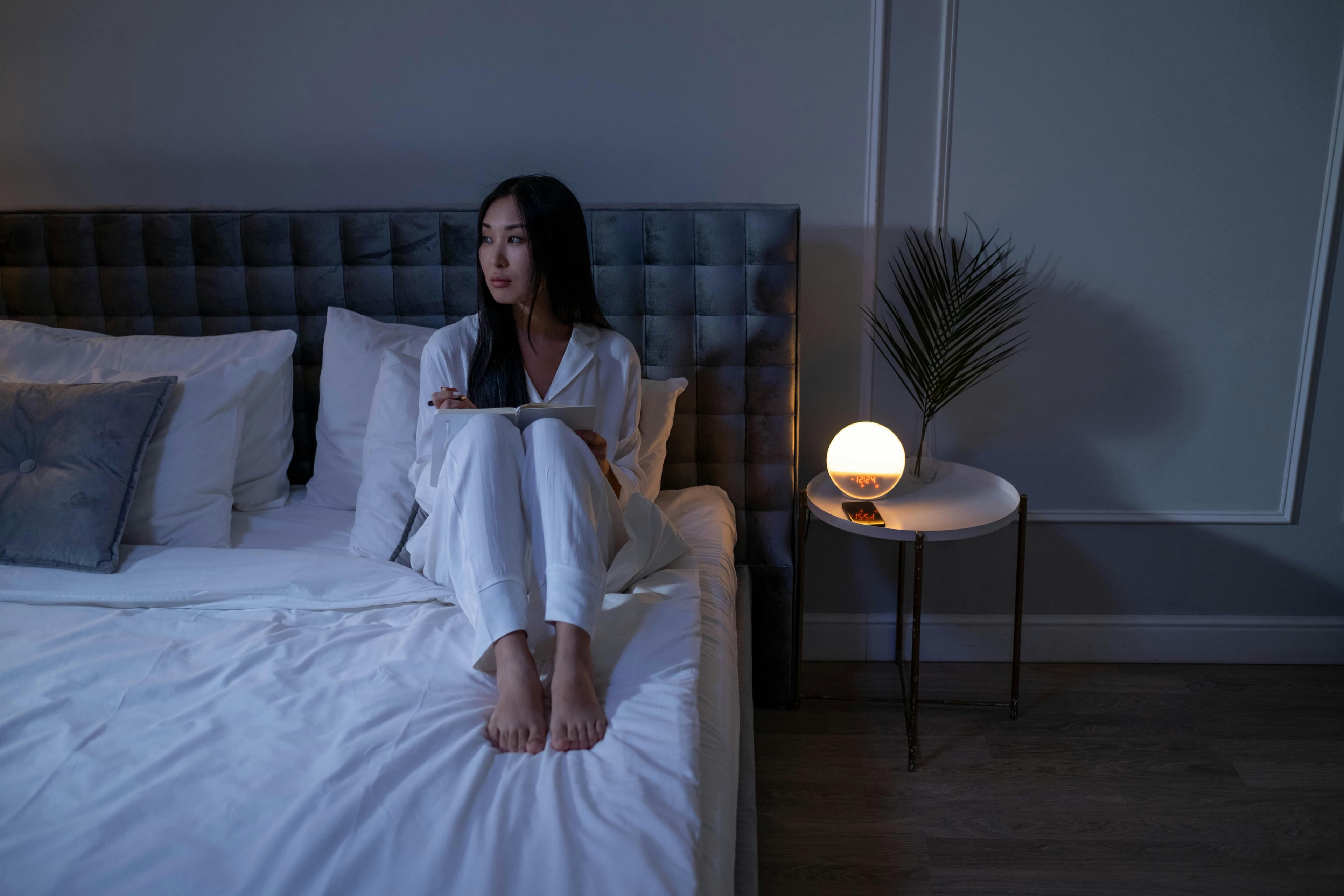 Woman experiencing sleep disruption
